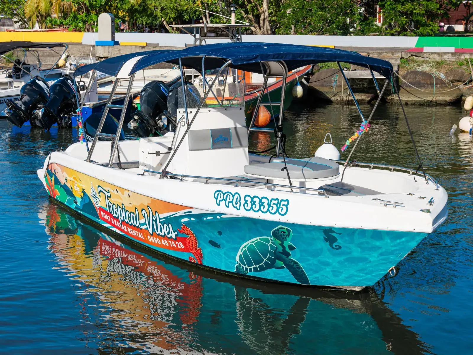 The Tropical Vibes boat moored in Deshaies
